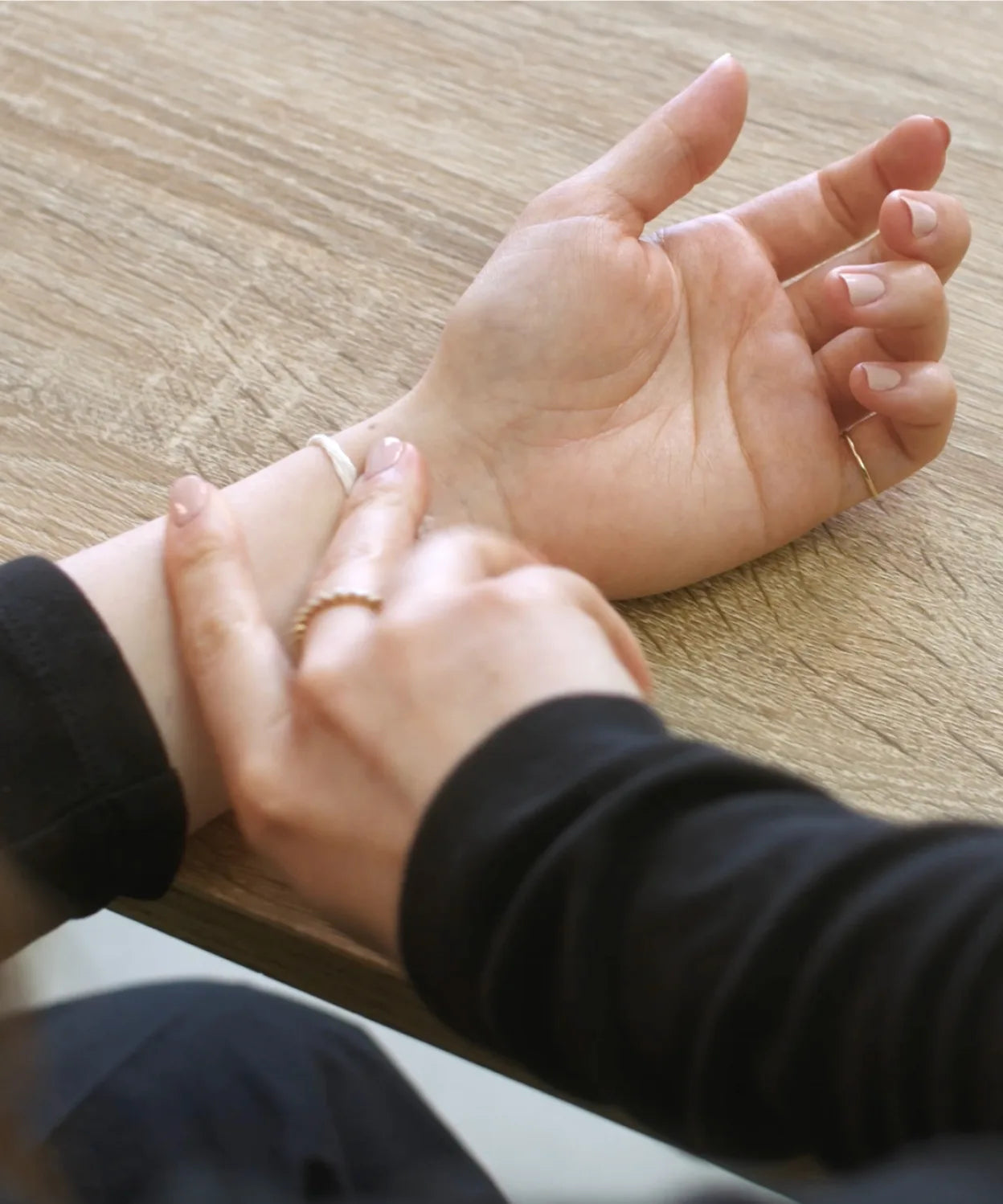 String wrapped around a wrist, showing an alternative way to measure bracelet size without measuring tape.